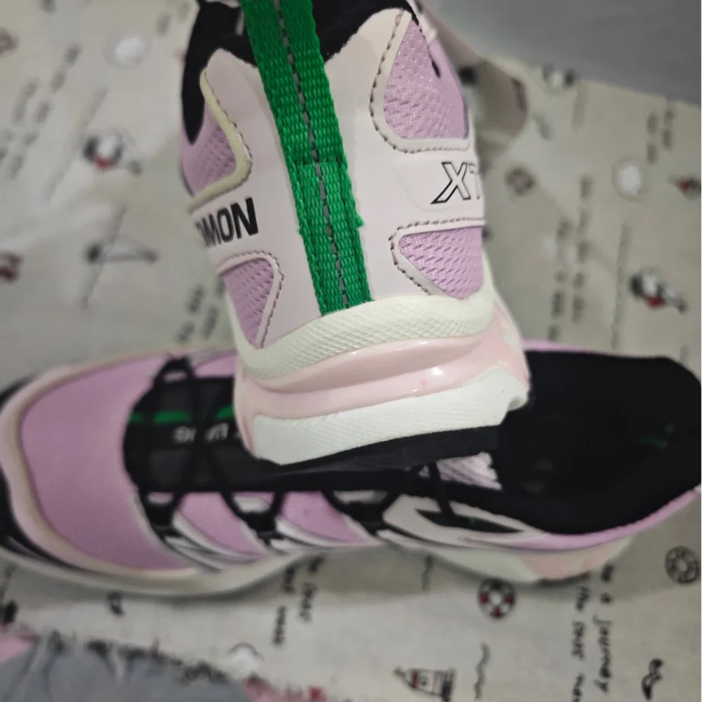 Salomon Pink and Black Women's Trail Sneakers with Green Pull Tabs